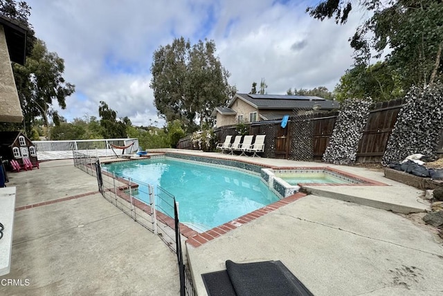 571 Citation Way, Newbury Park, CA 91320 - view of swimming pool featuring a patio, a pool with connected hot tub, and fence