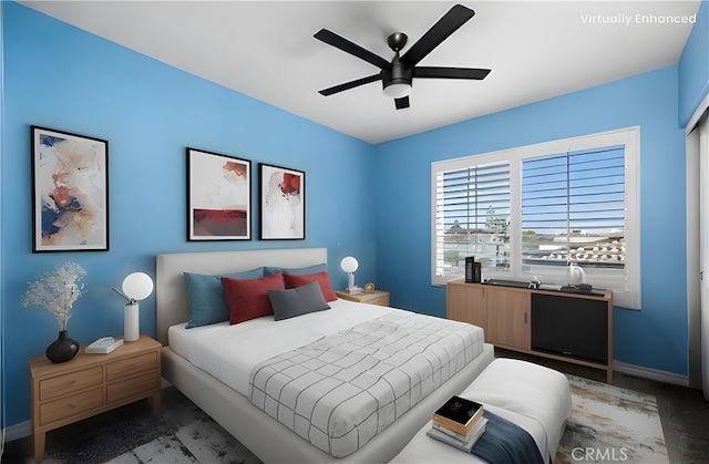 bedroom with baseboards and ceiling fan