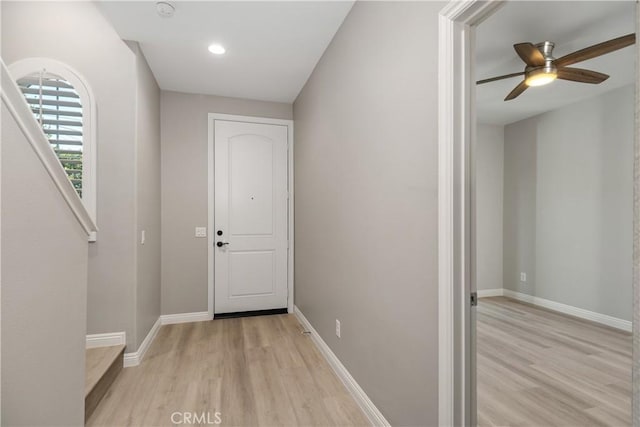 doorway to outside featuring recessed lighting, light wood-style floors, a ceiling fan, and baseboards