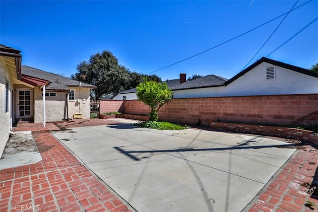 view of patio with fence