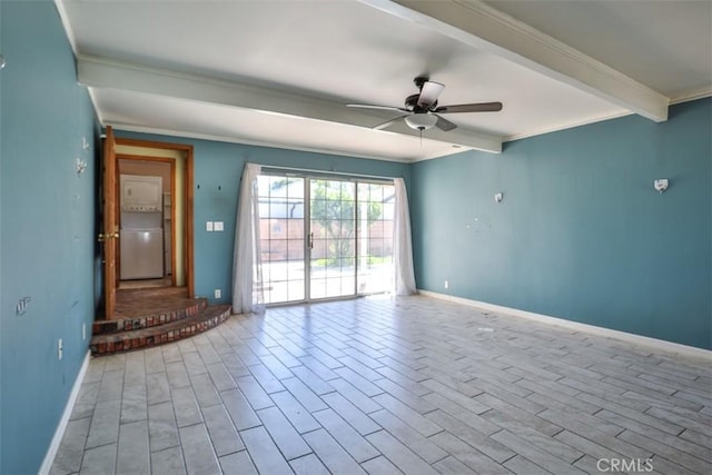 spare room featuring a ceiling fan, beamed ceiling, crown molding, and baseboards