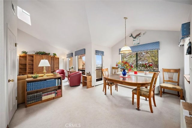 2344 Snowberry Ct, Avila Beach, CA 93424 - dining space with vaulted ceiling, visible vents, and carpet flooring