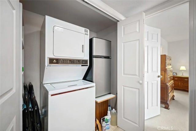 2344 Snowberry Ct, Avila Beach, CA 93424 - laundry area featuring stacked washer and dryer, laundry area, and light colored carpet
