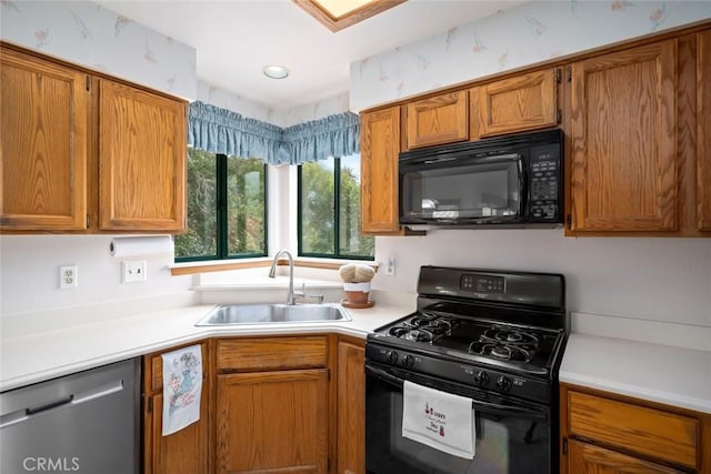 2344 Snowberry Ct, Avila Beach, CA 93424 - kitchen featuring light countertops, a sink, black appliances, and brown cabinets
