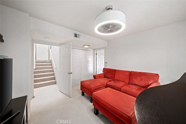 2344 Snowberry Ct, Avila Beach, CA 93424 - living room with stairs, visible vents, and light carpet
