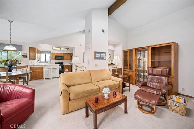 2344 Snowberry Ct, Avila Beach, CA 93424 - living room with light carpet, baseboards, high vaulted ceiling, and beam ceiling