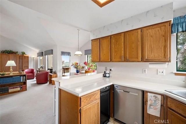 2344 Snowberry Ct, Avila Beach, CA 93424 - kitchen featuring light countertops, a peninsula, open floor plan, vaulted ceiling, and stainless steel dishwasher