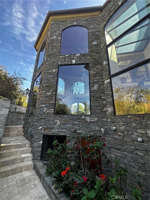 2695 Shady Ridge Ln, Diamond Bar, CA 91765 - exterior view of stone siding and an outdoor stone fireplace