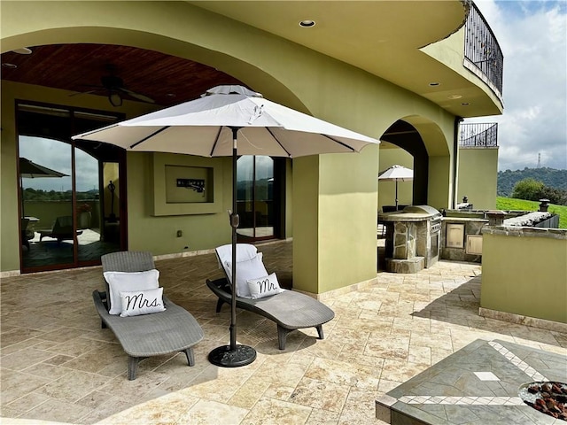 2695 Shady Ridge Ln, Diamond Bar, CA 91765 - view of patio with area for grilling, ceiling fan, and a balcony
