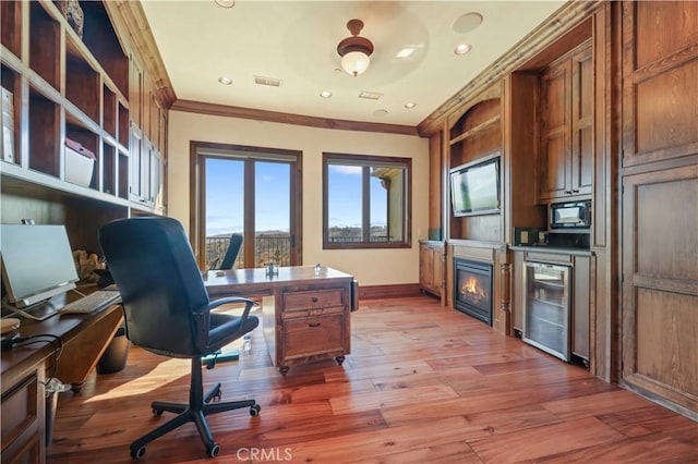2695 Shady Ridge Ln, Diamond Bar, CA 91765 - office space with wine cooler, crown molding, baseboards, light wood-style flooring, and recessed lighting