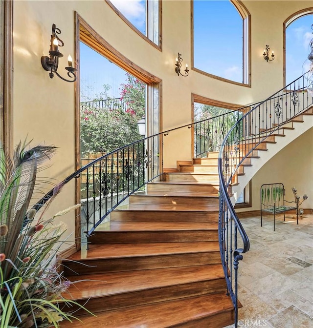 2695 Shady Ridge Ln, Diamond Bar, CA 91765 - staircase with a high ceiling, baseboards, and stone finish flooring