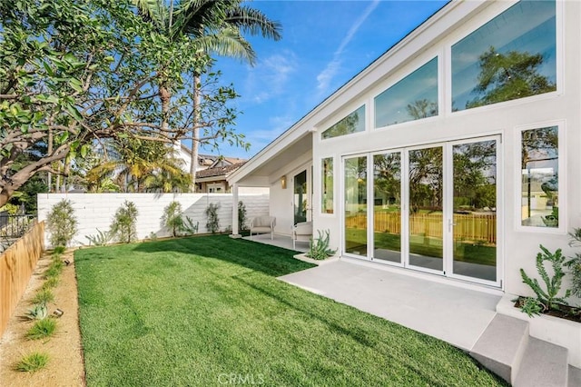 view of yard featuring a fenced backyard and a patio