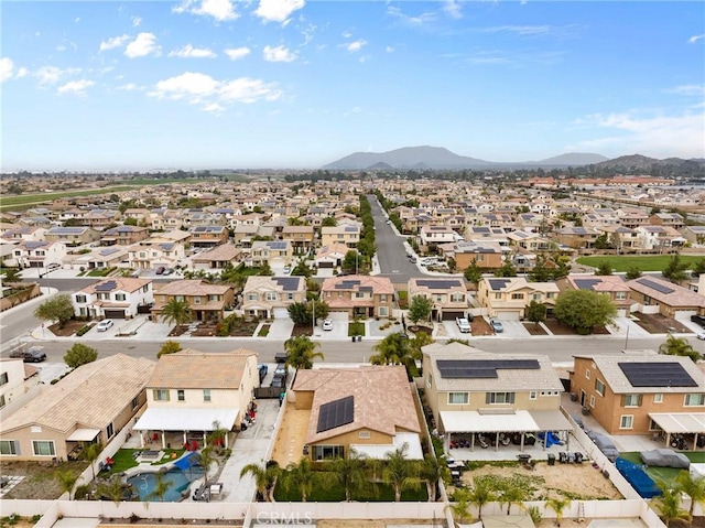 drone / aerial view with a mountain view and a residential view