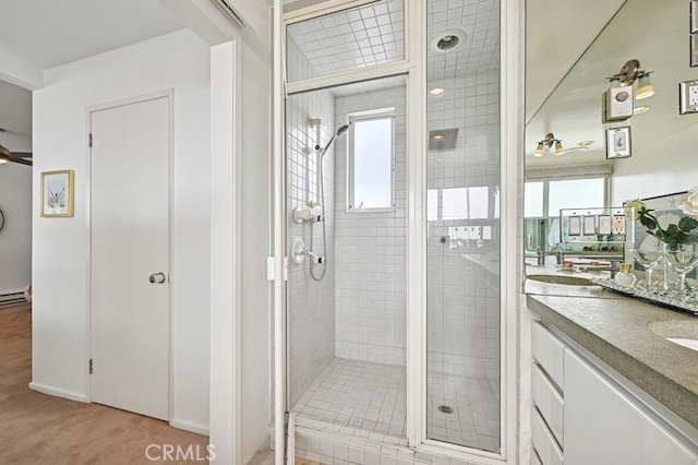6 Voyage St Unit 204, Marina Del Rey, CA 90292 - full bathroom featuring a shower stall, vanity, plenty of natural light, and baseboard heating