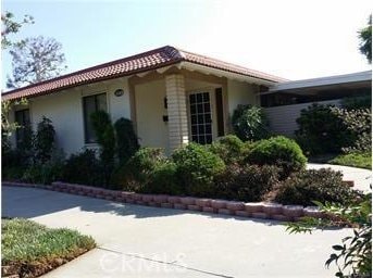view of home's exterior featuring stucco siding and a tile roof