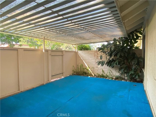 view of patio / terrace featuring fence