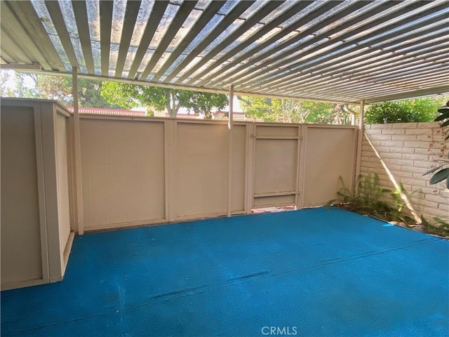 view of patio with fence