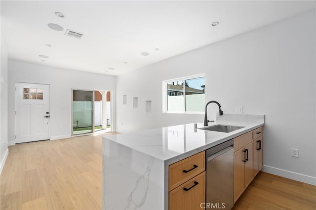 4641 W 130th St, Hawthorne, CA 90250 - kitchen featuring dishwasher, a sink, light wood-style flooring, baseboards, and light stone countertops