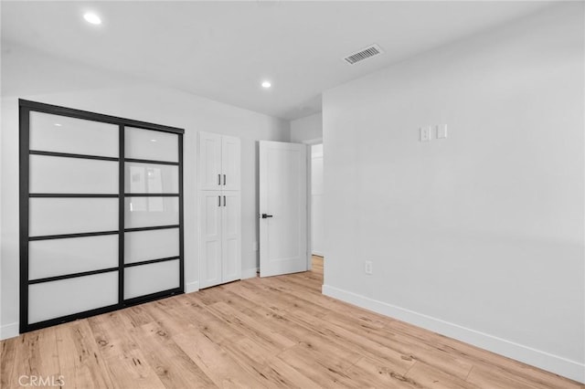 4641 W 130th St, Hawthorne, CA 90250 - unfurnished bedroom with baseboards, light wood-type flooring, and recessed lighting