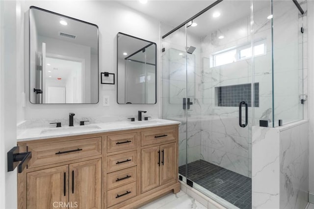 4641 W 130th St, Hawthorne, CA 90250 - bathroom featuring marble look tiles, double vanity, a marble finish shower, and recessed lighting