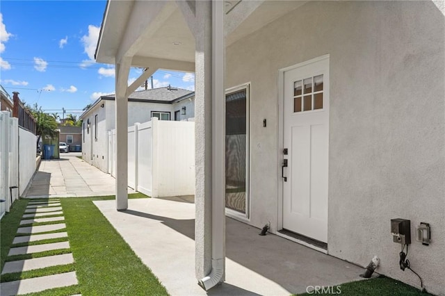 4641 W 130th St, Hawthorne, CA 90250 - entrance to property featuring stucco siding and a patio