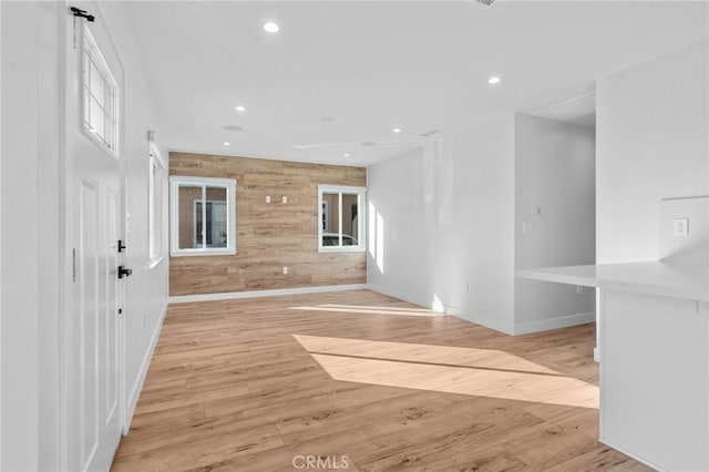 4641 W 130th St, Hawthorne, CA 90250 - foyer featuring baseboards, recessed lighting, plenty of natural light, light wood finished floors, and wooden walls