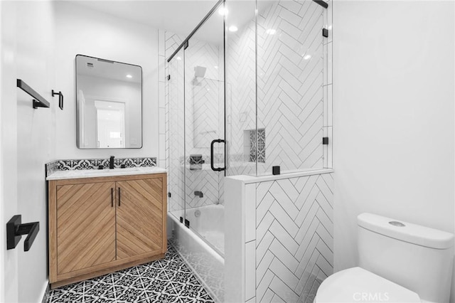 4641 W 130th St, Hawthorne, CA 90250 - bathroom with vanity, toilet, and shower / bath combination with glass door