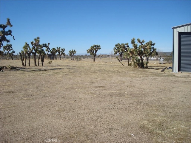 view of yard featuring a rural view
