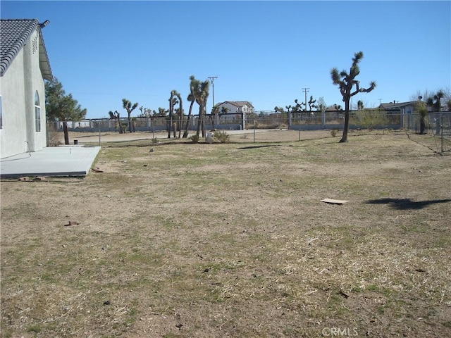 view of yard with fence