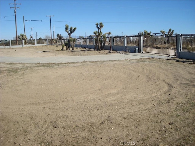 view of street featuring a gate
