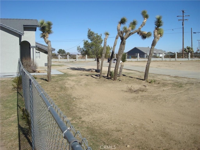 view of yard featuring fence