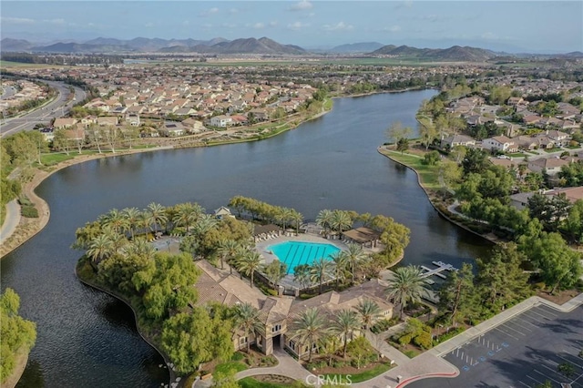 bird's eye view with a residential view and a water and mountain view