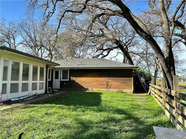 view of yard with fence