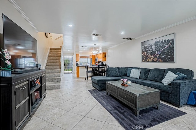 25301 Pine Creek Ln, Wilmington, CA 90744 - living area with light tile patterned floors, ornamental molding, stairway, and recessed lighting