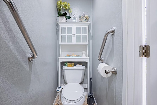 25301 Pine Creek Ln, Wilmington, CA 90744 - bathroom with toilet and baseboards