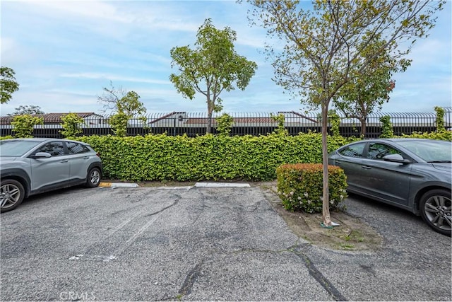 25301 Pine Creek Ln, Wilmington, CA 90744 - view of uncovered parking lot