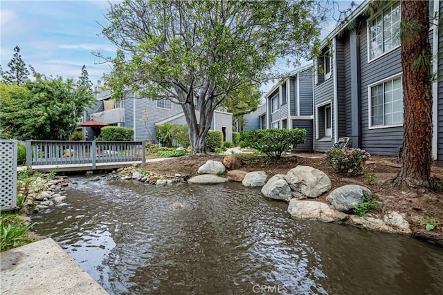25301 Pine Creek Ln, Wilmington, CA 90744 - view of property's community with a deck