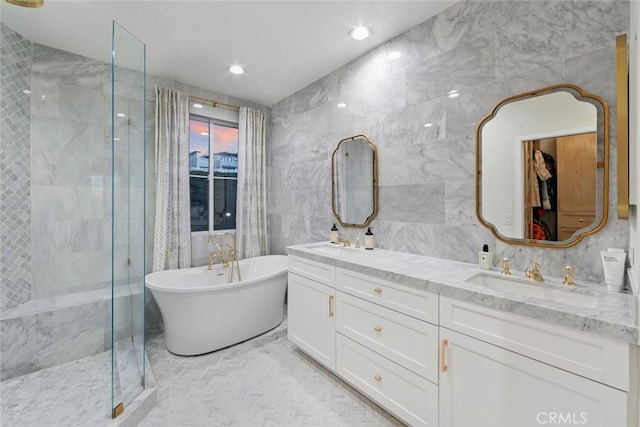 7 Suprema Dr, Newport Coast, CA 92657 - bathroom with tile walls, an enclosed shower, a freestanding bath, and double vanity