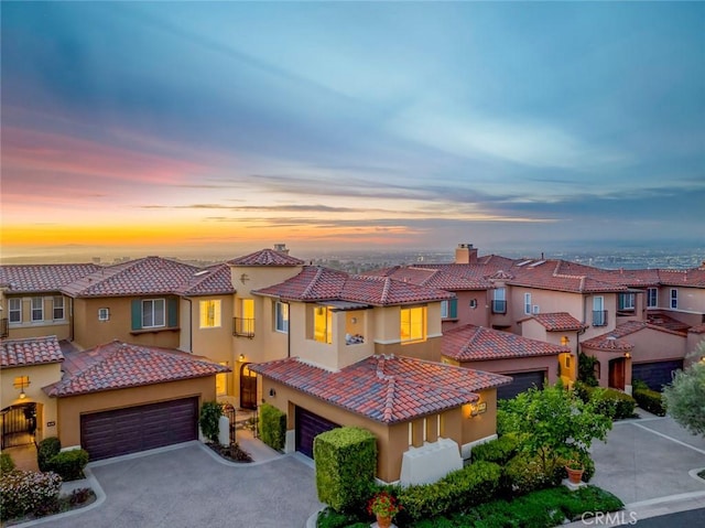 7 Suprema Dr, Newport Coast, CA 92657 - view of front of house with a residential view, driveway, stucco siding, and a tiled roof