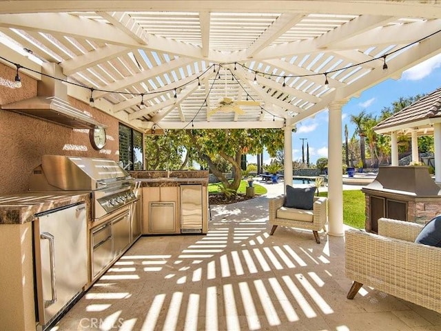 2565 Cliff Rd, Upland, CA 91784 - view of patio featuring a pergola, area for grilling, and exterior kitchen