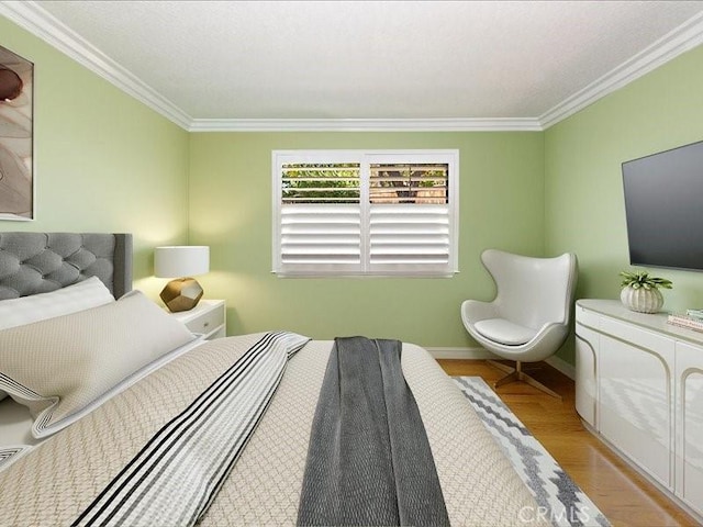 2565 Cliff Rd, Upland, CA 91784 - bedroom featuring crown molding, baseboards, and wood finished floors
