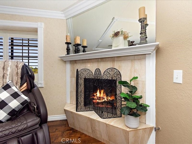 2565 Cliff Rd, Upland, CA 91784 - detailed view of wood finished floors, a tile fireplace, ornamental molding, and a textured wall