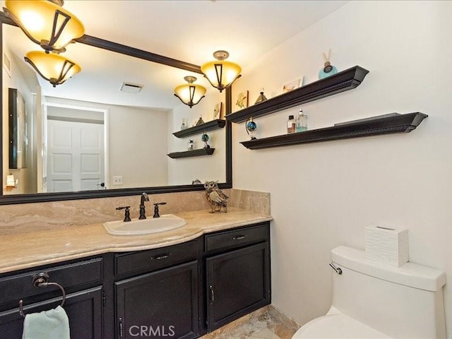2565 Cliff Rd, Upland, CA 91784 - bathroom with toilet, visible vents, and vanity