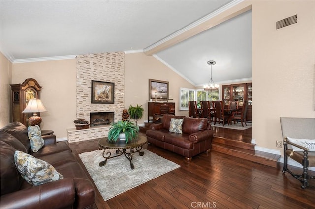 2565 Cliff Rd, Upland, CA 91784 - living room featuring a chandelier, hardwood / wood-style floors, a fireplace, and crown molding