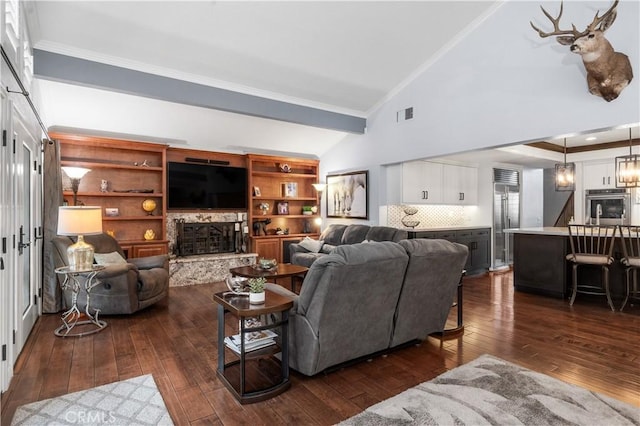 2565 Cliff Rd, Upland, CA 91784 - living area with dark wood finished floors, a stone fireplace, crown molding, and high vaulted ceiling