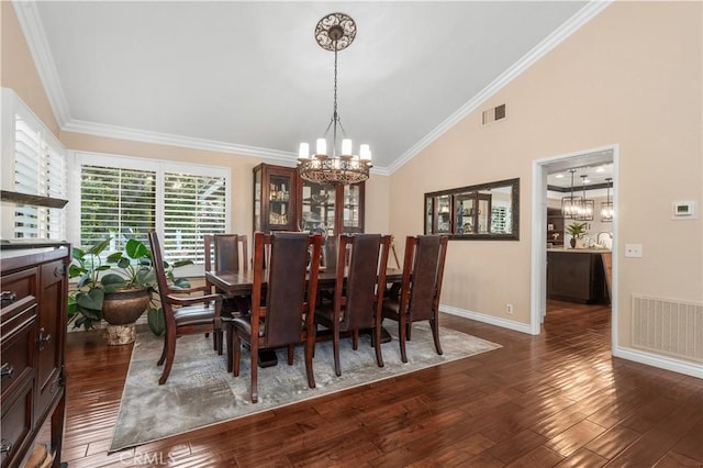2565 Cliff Rd, Upland, CA 91784 - dining area featuring a chandelier, vaulted ceiling, dark wood finished floors, and ornamental molding