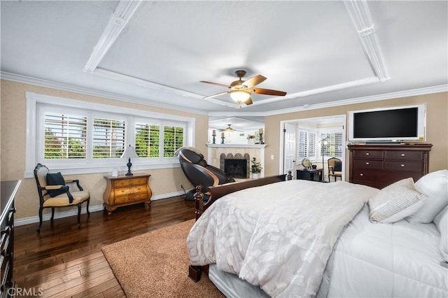 2565 Cliff Rd, Upland, CA 91784 - bedroom featuring a tray ceiling, wood-type flooring, ornamental molding, a fireplace, and a ceiling fan
