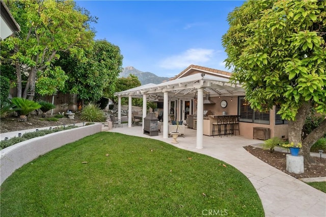 2565 Cliff Rd, Upland, CA 91784 - view of yard with a pergola, a mountain view, and a patio