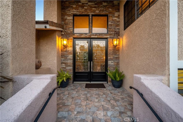 2565 Cliff Rd, Upland, CA 91784 - property entrance featuring french doors, stone siding, and stucco siding
