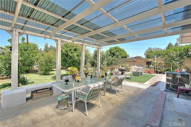 view of patio featuring outdoor dining area